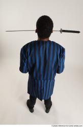 Garson STANDING POSE WITH KATANA AND TWO GUNS